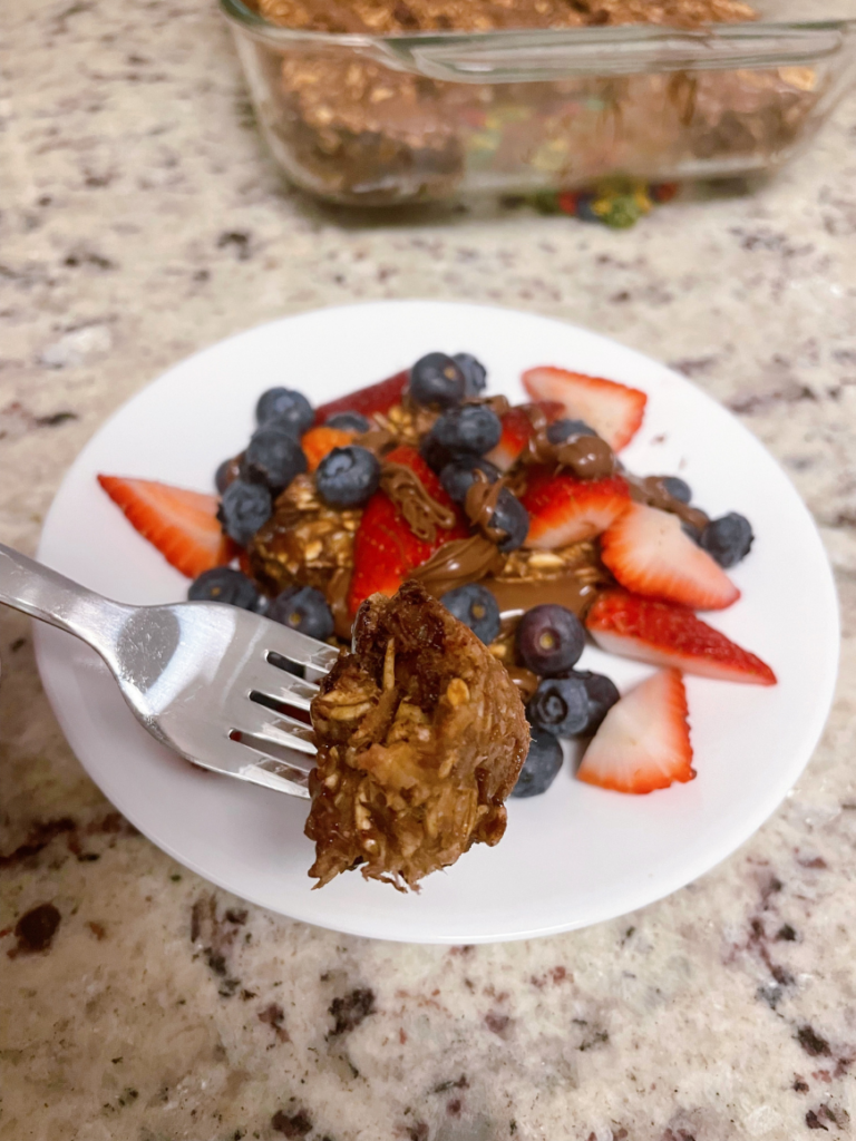 This baked oatmeal bars recipe is the perfect combo of healthy ingredients, melty chocolate & heaven in a bite. Finished in under 30 minutes! | Healthy Breakfast Recipes | Vitality Vixens Healthy Lifestyle Blog